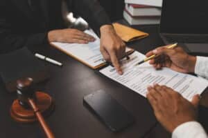Board certified personal injury lawyer explaining legal options during a consultation