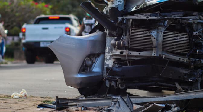 Severe vehicle crash into pole showing front-end damage scene Dallas truck accident lawyer may investigate