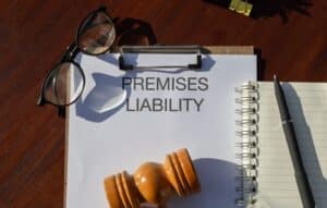San Antonio premises liability attorney concept with gavel, documents, and legal paperwork on a desk.