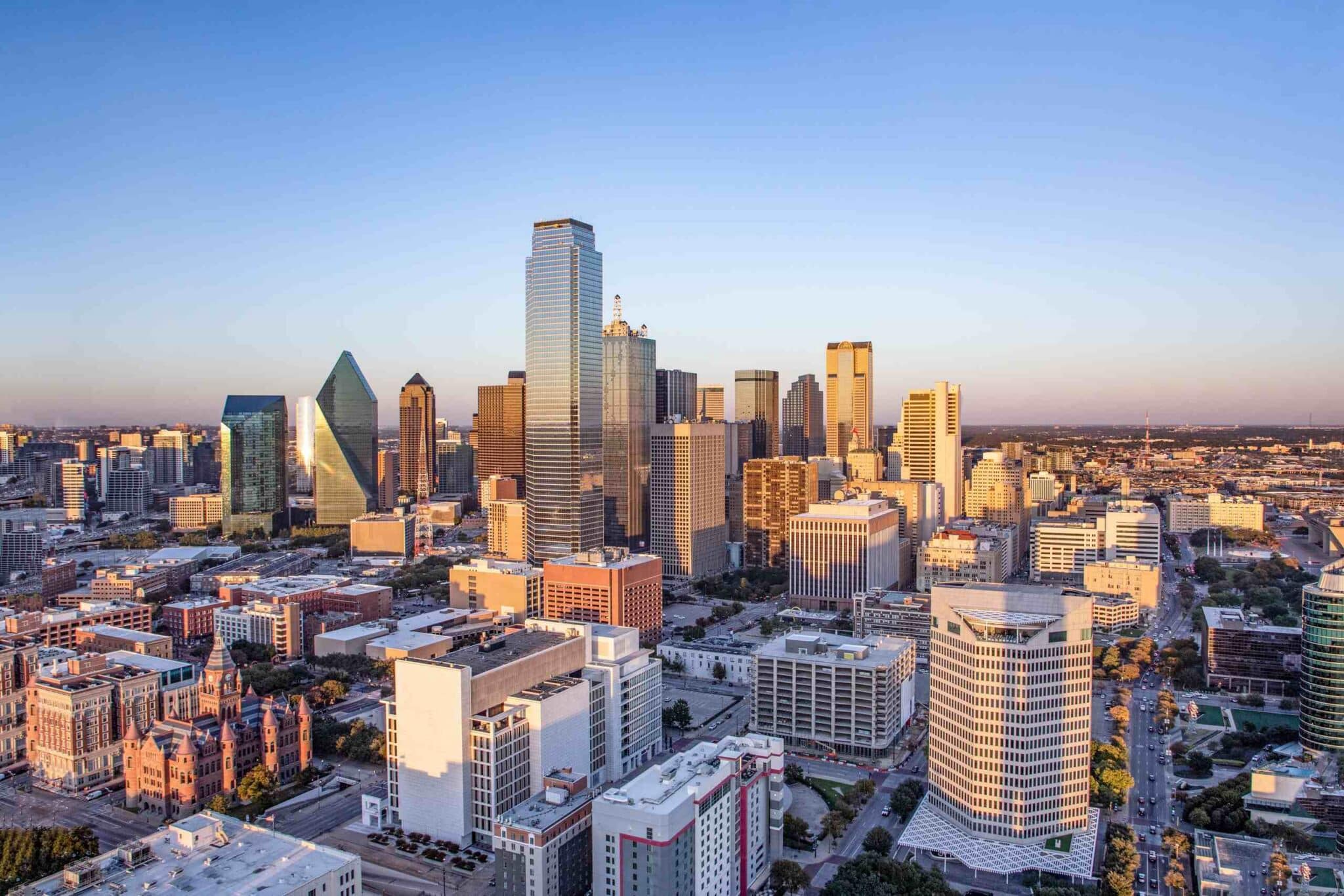 Aerial view of the Dallas skyline at sunset, representing the local legal jurisdiction for wrongful death claims.