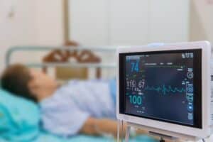 A medical monitor showing vital signs, relevant to Texas wrongful death and survival claims.